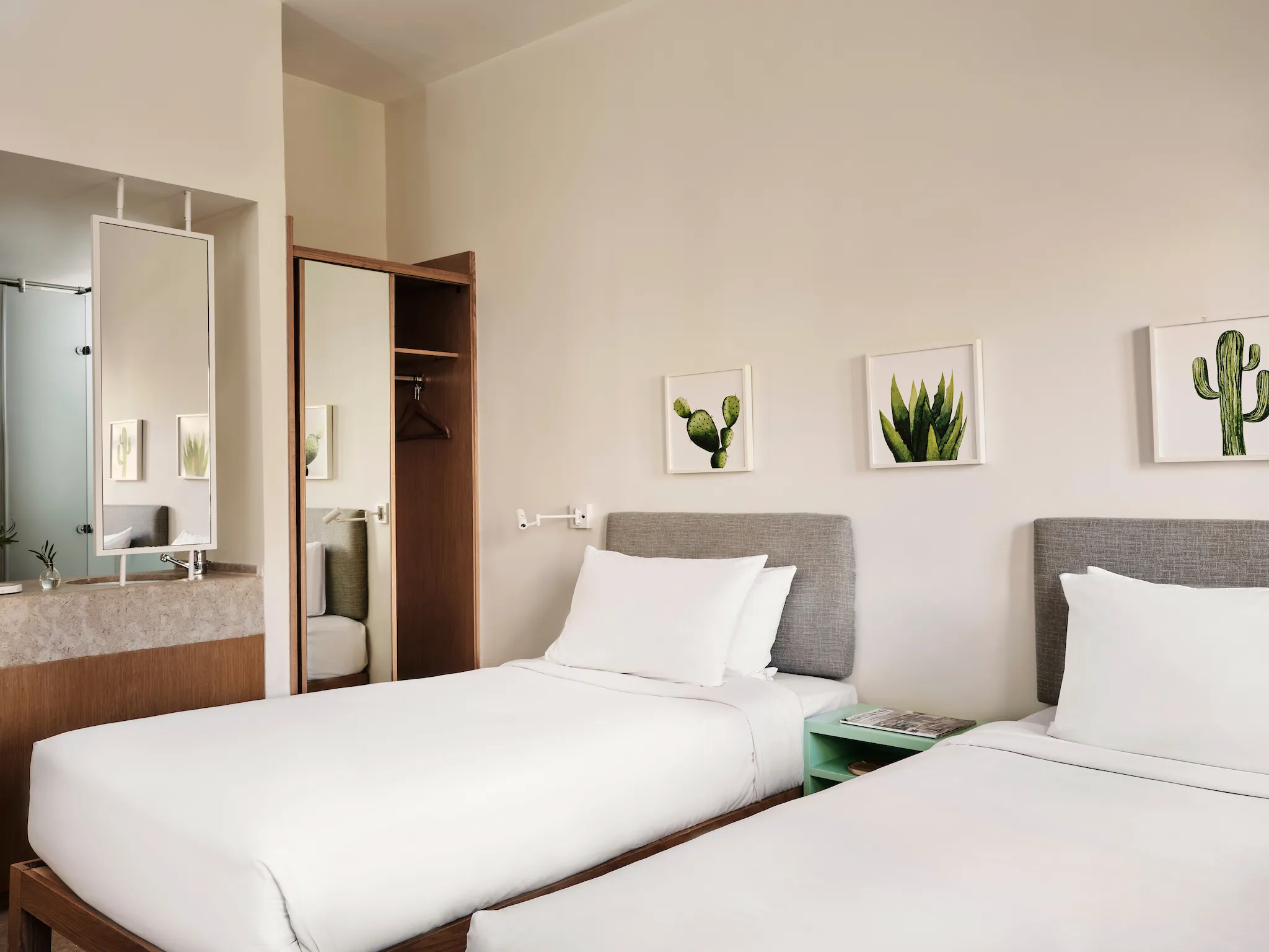 Standard Room with double bed beside a window at Captain’s Inn El Gouna