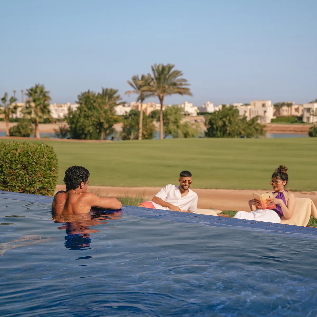 Friends enjoying the infinity pool